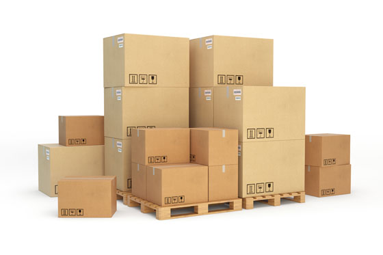 Cardboard boxes on a pallet. Isolated on white background.